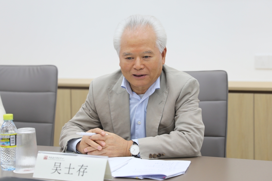 吴士存会见《参考消息》报社调研组 