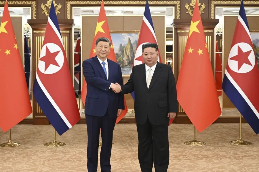 习近平同金正恩举行会谈